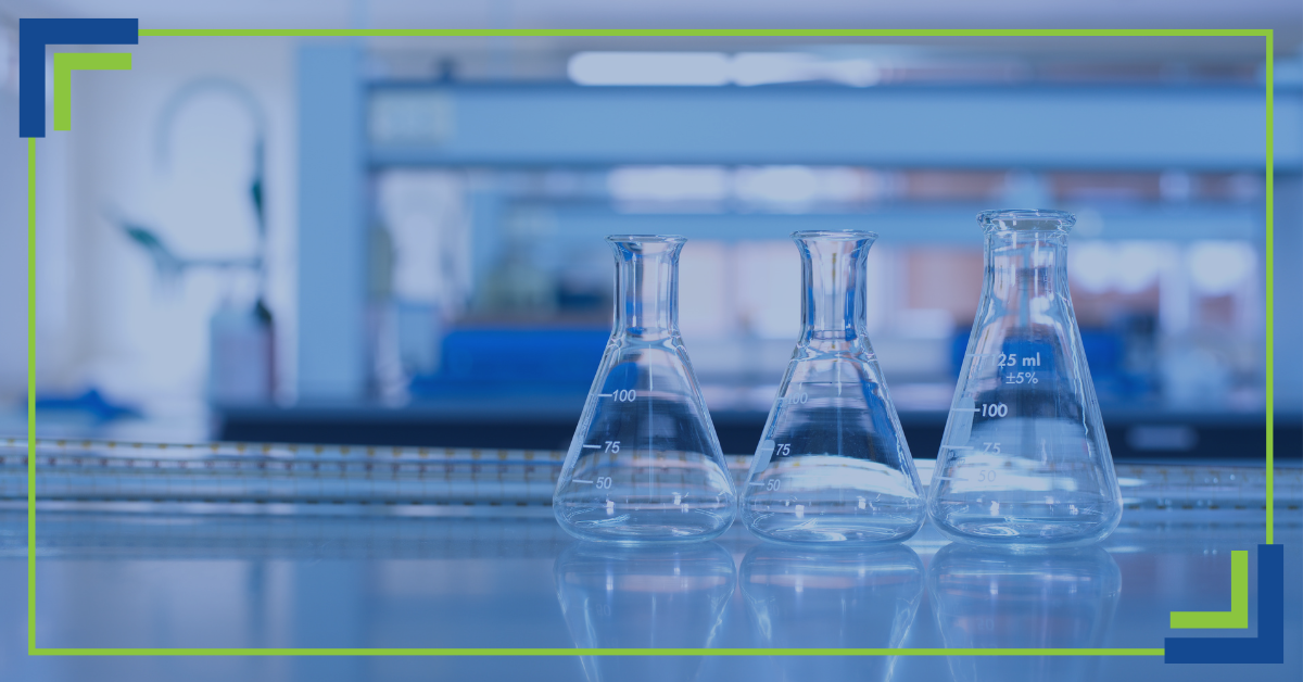 glass lab equipment sitting on a counter