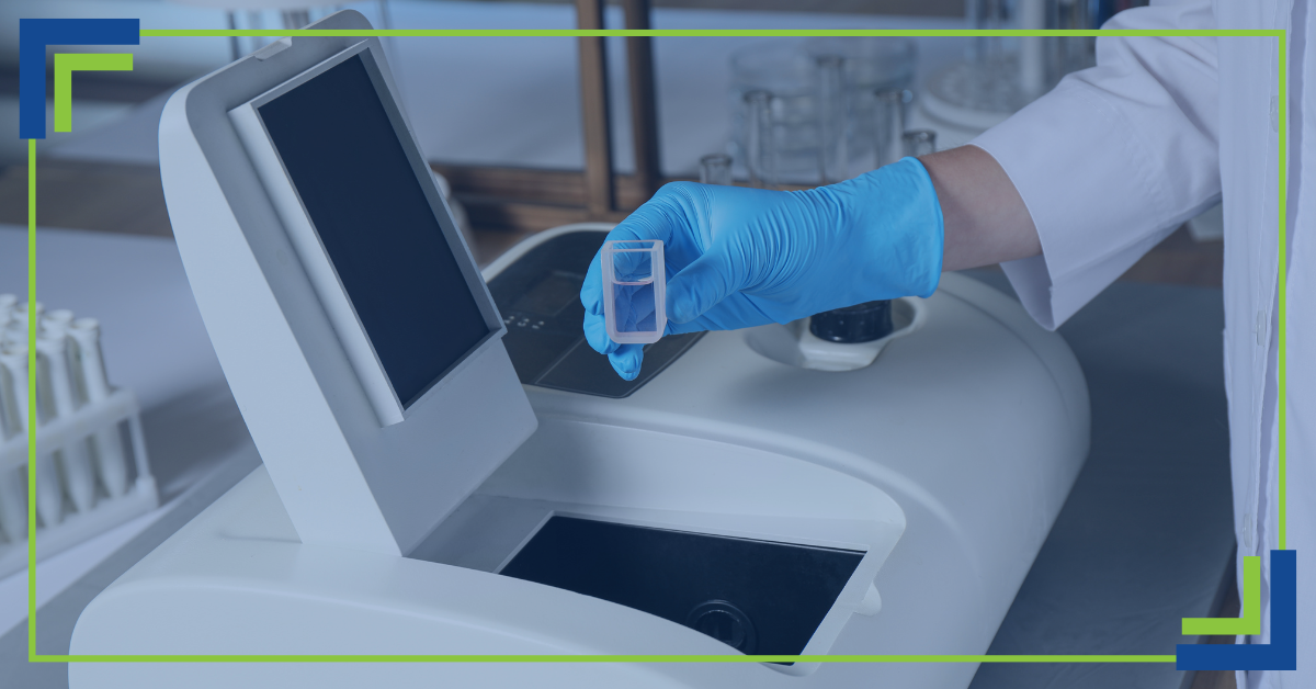 A scientist using a UV-Vis spectrophotometer